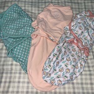 Infant girl swaddles